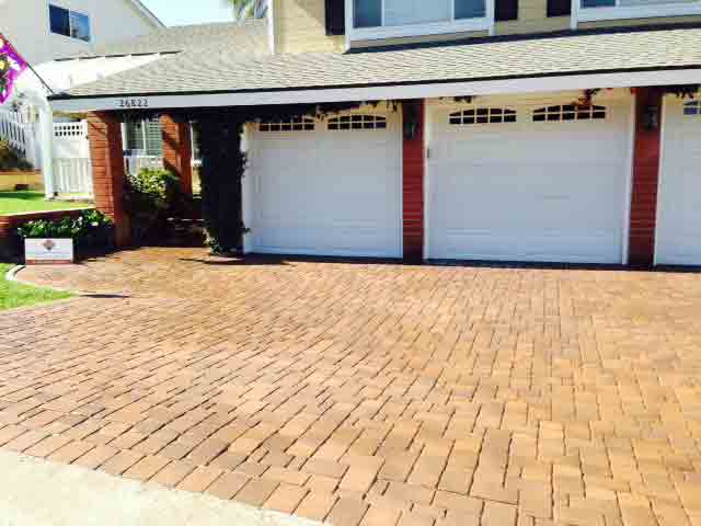 Driveway covered with thin one inch pavers. Existing driveway did not need to be removed.